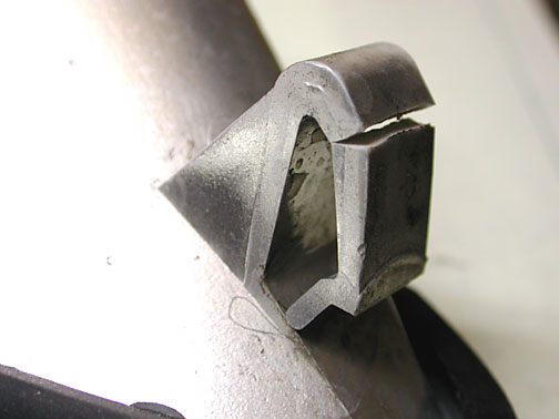 broken indicator lens retaining tab